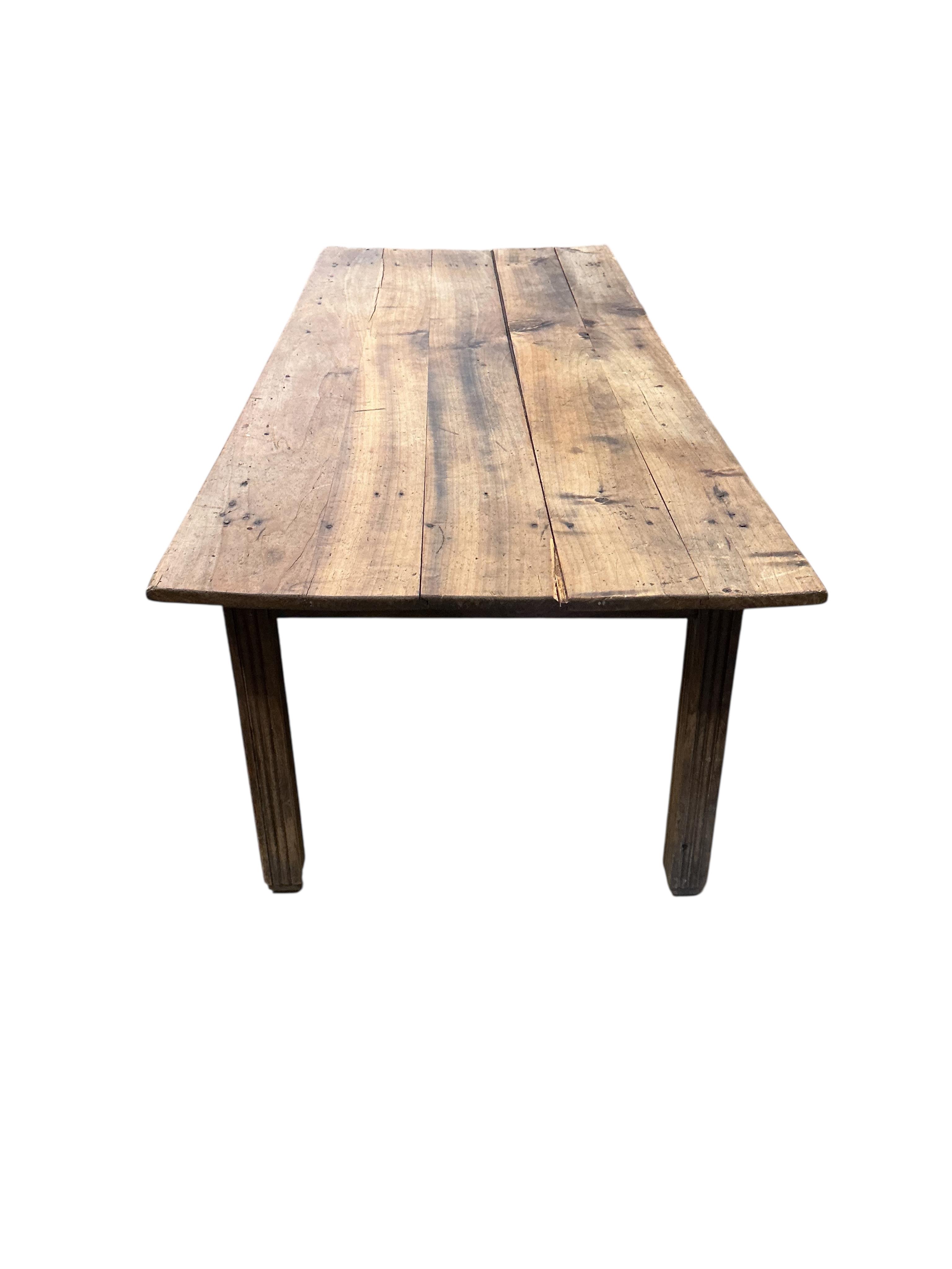 A 19th century French rectangular fruitwood kitchen table, width 224cm, depth 88cm, height 73cm